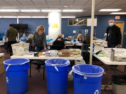 Workers at the Washoe County Registar of Voters Office sort mail-in ballots on Oct. 29.
