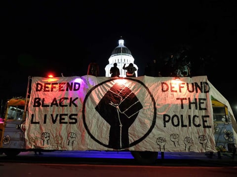 Demonstrators march in downtown Sacramento on Nov. 4, 2020.