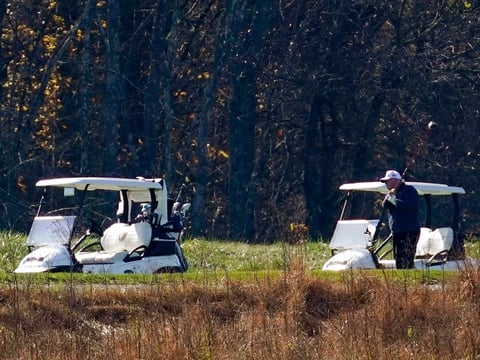 President Donald Trump participates in a round of golf at the Trump National Golf Course on Saturday, Nov. 7, 2020, in Sterling, Va.