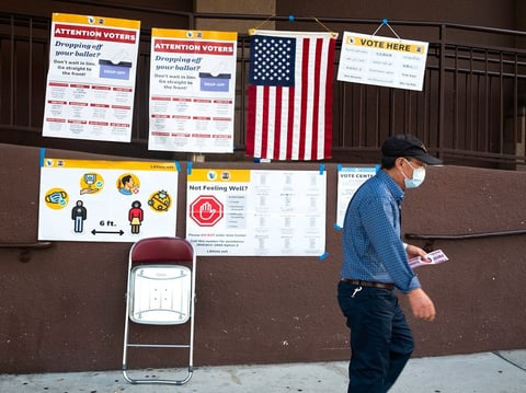 A voter exits a polling place in the West Adams neighborhood of Los Angeles on Nov. 3, 2020.