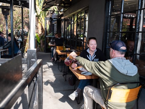 Cara and Michael Busch have a meal and wine at Revolution Winery & Kitchen Wednesday, Jan 13, 2021.