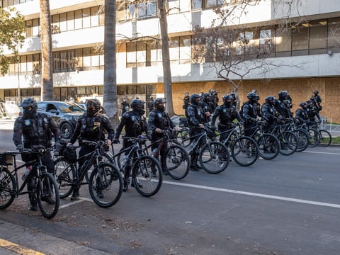 Sacramento Police form a line outside county DA office on Wednesday, Jan 20, 2021.