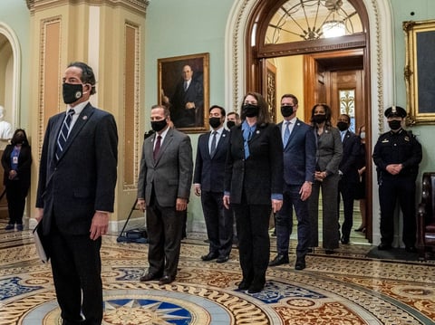 House impeachment managers, led by Rep. Jamie Raskin, D-Md., seen leaving the Senate floor after delivering the article of impeachment on Capitol Hill on Jan. 25. They will deliver the case against former President Trump starting Tuesday.