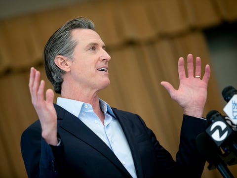 Gov. Gavin Newsom speaks to the press during a visit to Ruby Bridges Elementary School in Alameda on March 16, 2021.