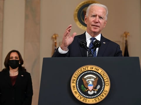 President Biden delivers remarks Tuesday on the guilty verdict against former police officer Derek Chauvin, as Vice President Harris looks on.