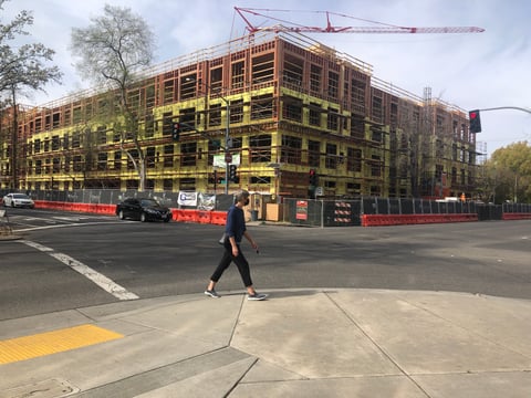 New housing is under construction at 16th and H Streets in Sacrameto. This project replaces a long vacant motel. Housing construction is up in Sacramento, but housing for poorer residents is falling short.