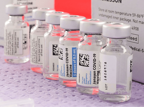 Bottles of the single-dose Johnson & Johnson COVID-19 vaccine await transfer into syringes for administering last month in Los Angeles before the vaccine's pause.