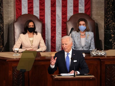 President Joe Biden speaks to a joint session of Congress on Wednesday in the House Chamber at the U.S. Capitol in Washington, as Vice President Kamala Harris and House Speaker Nancy Pelosi watch.