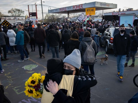 People embrace last month in Minneapolis after the verdict is announced in the trial of former Minneapolis police officer Derek Chauvin in the killing of George Floyd.