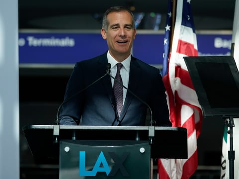 In this May 24, 2021 file photo Los Angeles Mayor Eric Garcetti speaks a press conference at Los Angeles International Airport, in Los Angeles.