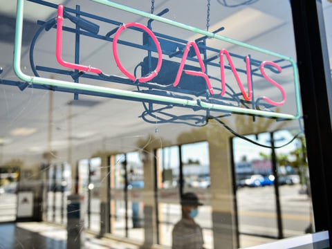 A customer inside a loan agency, ACE Cash Express, in Wilmington on July 28, 2021.