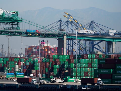 Containers are stacked at the Port of Los Angeles in Los Angeles on Oct. 1, 2021. The backlog is driving delays in arrival of medical equipment.