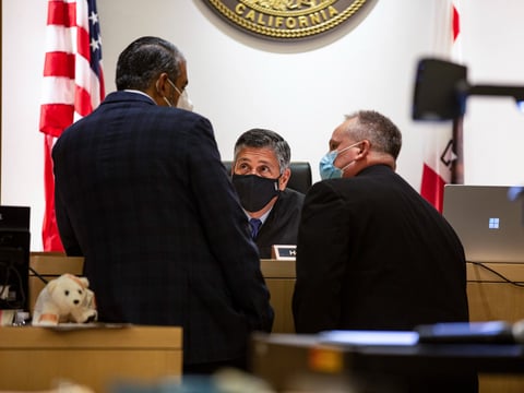 Lawyers address a judge in Madera County Superior Court in Madera on Tuesday, Sept. 29, 2021.