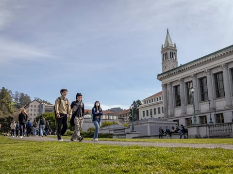 Students walk past the Doe Memorial Library on the University of California, Berkeley campus on Feb. 3, 2022.