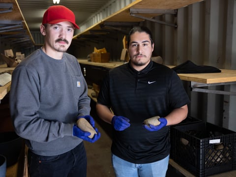 David Richter (Habematolel Pomo of Upper Lake) and Johnathan Costillas (Tamien Nation) are tribal cultural monitors for the Habematolel Pomo of Upper Lake, pictured holding cultural items returned to the tribe Monday, April 25, 2022.