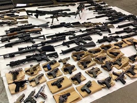 Assault weapons, multiple high-capacity magazines, pistols, and other weapons seized from the home of homicide suspect Vu Thai, who was arrested June 5, 2022, in connection with a fatal shooting in San Jose.