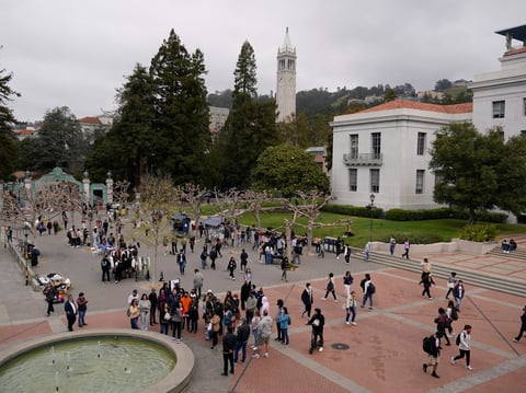 Students make their way through Sproul Plaza on the University of California, Berkeley, campus Tuesday, March 29, 2022, in Berkeley, Calif.