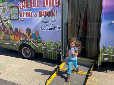 Annamarie Rodriguez enjoys it when the Merced County Library bookmobile stops in the town of Planada on Tuesdays.