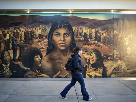 “La Memoria de la Tierra,” a mural created by Judith Baca, resides on the north side of Ackerman Union at UCLA in Los Angeles on Nov. 9, 2022. UCLA aims to become a Hispanic Serving Institution by 2025.