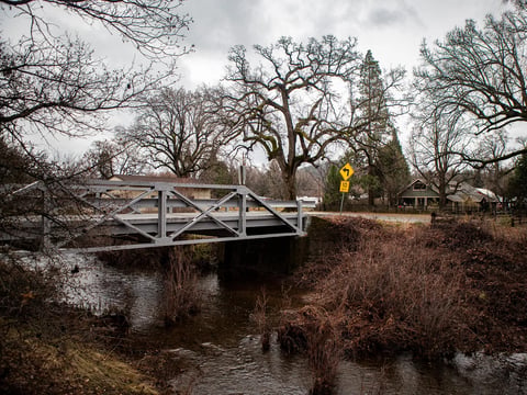 A bridge going over the creek leading to the rural community of Paynes Creek on Dec. 9, 2022.