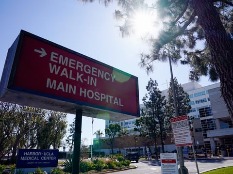 This Feb. 24, 2021 file photo shows an emergency room sign outside Harbor-UCLA Medical Center in Torrance, Calif.