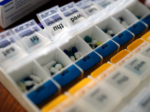 Sara Hayden keeps a daily tally of her medication intake at home Thursday, Aug. 10, 2017, in Half Moon Bay, Calif. Hayden lost her job as a data researcher because of medical problems and is now covered by Medi-Cal.