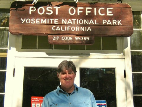John Reynolds outside of the Post Office on Christmas, a regular part of his job.