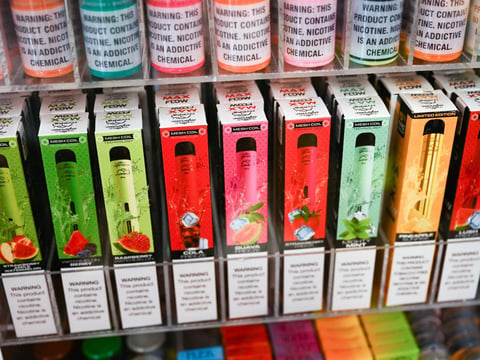 Flavored vape and e-cigarette products on display at a convenience store in El Segundo, California, last summer.