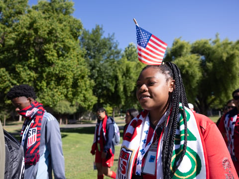 Sienna Jackson of the US Homeless World Cup team marches before the tournament Saturday, July 8, 2023.