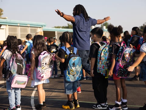 Students line up before the first day of school at John Sloat Elementary School in Sacramento, Calif., on Thursday, Aug. 31, 2023.