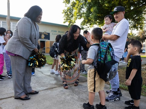Interim Superintendent of SCUSD, Lisa Allen, and Sacramento City Council Member Mai Vang greet students and families at John Sloat Elementary in Sacramento Calif., on the first day of instruction, Aug. 31, 2023.