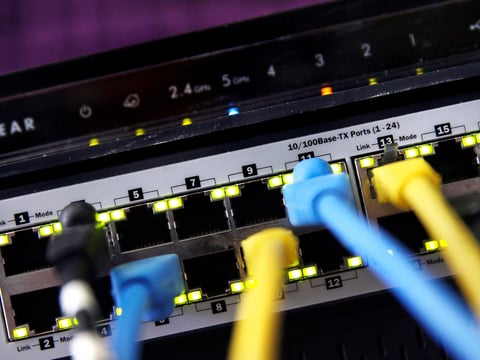 A home router and internet switch are displayed on June 19, 2018, in East Derry, N.H. Telecommunications industry groups on Wednesday, May 4, 2022,