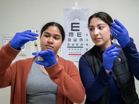 Nursing students practice injection procedures in the clinical skills lab at the University of San Francisco in San Francisco on Oct. 9, 2023.