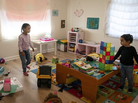 Neveah, left, 6, and brother, Choncey, 4, play at home in Oakland on Nov. 24, 2023.