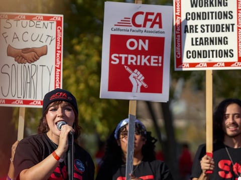 Jackie Barrett, a student and intern with California Faculty Associations, speaks to the crowd during a faculty strike at CSU Pomona on Dec. 4, 2023.