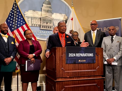 Assemblymember Reggie Jones-Sawyer, D-Los Angeles, speaks about a package of reparations legislation at a press conference at the state Capitol on Wednesday, Feb. 21, 2024.