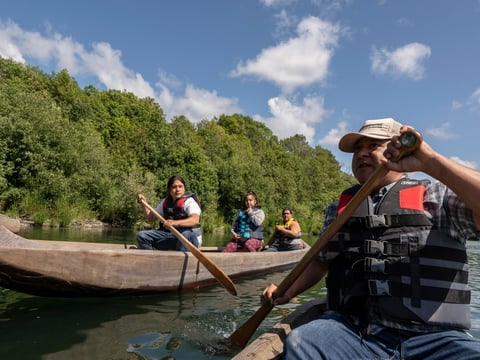 Yurok tribal members lead a redwood canoe tour on the lower Klamath River on Tuesday, June 8, 2021, in Klamath, Calif.