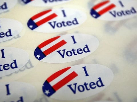 A sheet of voter stickers is seen inside a polling place in California.