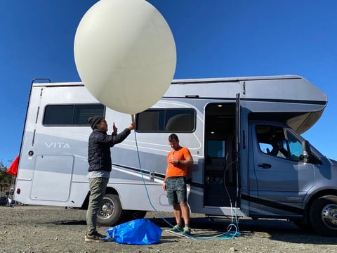 Andrew Song and Luke Iseman of Make Sunsets ready for a launch. Iseman says they hope to someday cool the earth on a larger scale.