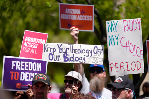 Abortion rights supporters gather outside the Capitol, Wednesday, April 17, 2024, in Phoenix. Arizona doctors could come to California and provide abortions for their patients.