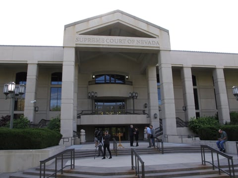 People gather outside the Nevada Supreme Court in Carson City, May 8, 2018.