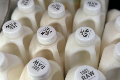 Bottles of raw milk are displayed for sale at a store in Temecula, Calif., on Wednesday, May 8, 2024.