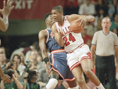 The Chicago Bulls' Bill Cartwright (24) tries to drive around the New York Knicks' Patrick Ewing during the first quarter of Game of 4 of the Eastern Conference semifinals, Sunday, May 15, 1994 in Chicago.