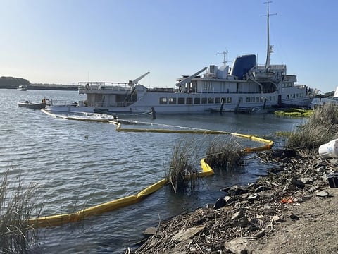 This photo provided by the U.S. Coast Guard District 11 shows The Aurora, a non-operational 294-foot cruise ship moored northwest of Stockton, Wednesday, May 22, 2024, that began to sink and discharge product.