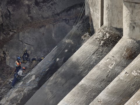 More than 100 years old, San Diego’s Lake Hodges Dam is one of 42 dams where the state has restricted storage because of safety concerns. Repairs began in 2022 and the dam is expected to be replaced by 2034.