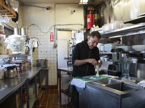 Sergio Carrillo prepares food at El Rincon restaurant in the San Ysidro neighborhood of San Diego on April 16, 2024.