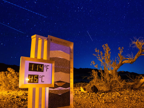 A long exposure image of the thermostat at the Furnace Creek Visitors Center taken just after 10:00 p.m., in Death Valley National Park, Calif., Sunday, July 7, 2024.