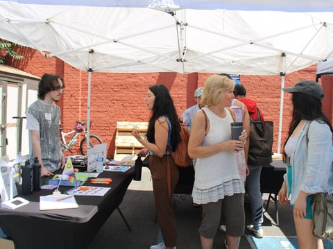 CleanStart’s booth at its community kickoff event for the Clean Tech for All initiative held at Taqueria Jalisco on June 29.