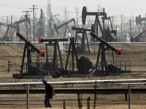 In this Jan. 16, 2015, file photo, pumpjacks operate in Bakersfield, Calif.