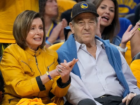 Rep. Nancy Pelosi, D-Calif., left, and her husband, Paul, watch during Game 4 in the first round of the NBA basketball playoffs between the Golden State Warriors and the Sacramento Kings in San Francisco, April 23, 2023.